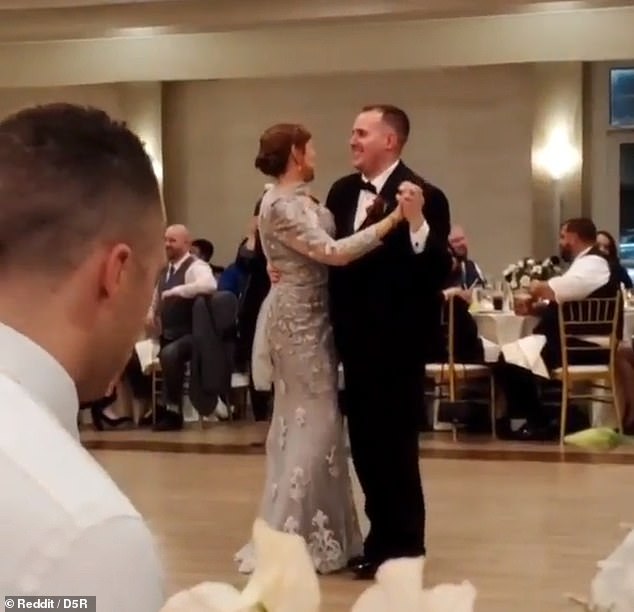 Wedding guest is branded “sad” for watching football during the mother-son dance at the reception
